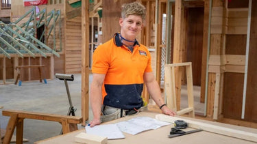 Carpenter wearing hi-vis on the job site β Carpenter Starter Kit
